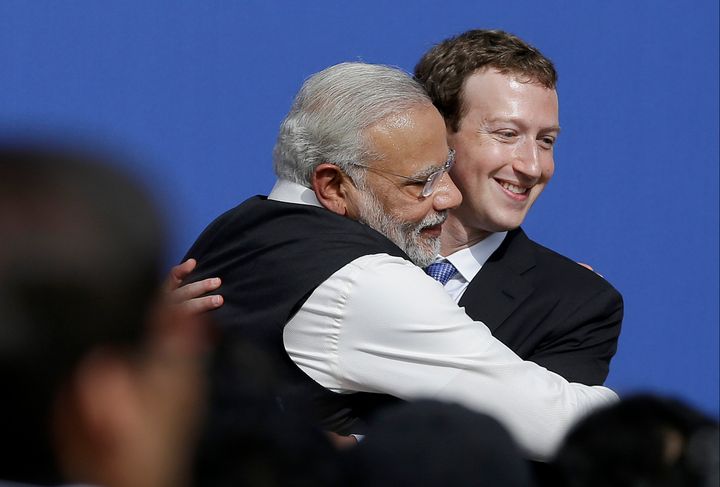 Facebook CEO Mark Zuckerberg hugs Prime Minister of India Narendra Modi at Facebook in Menlo Park, California, on Sept. 27, 2015.