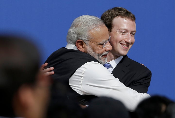 Facebook CEO Mark Zuckerberg hugs Prime Minister of India Narendra Modi at Facebook in Menlo Park, California, on Sept. 27, 2015.