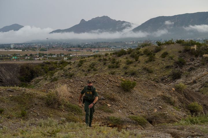 U.S. Border Patrol Agent Joel Freeland patrols at the base of Mount Christo Rey in Sunland Park, New Mexico on September 1, 2021.