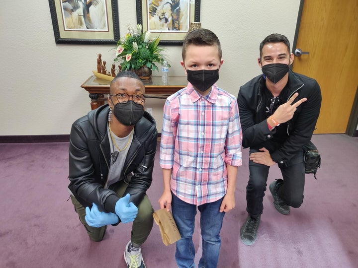 Dante poses with show producers backstage after filming "Kids Say the Darndest Things."