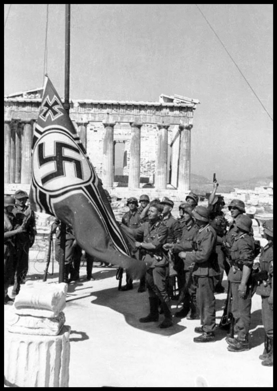 German troops raising the swastika over the Acropolis, 1941. (Photo by: Photo 12/Universal Images Group...
