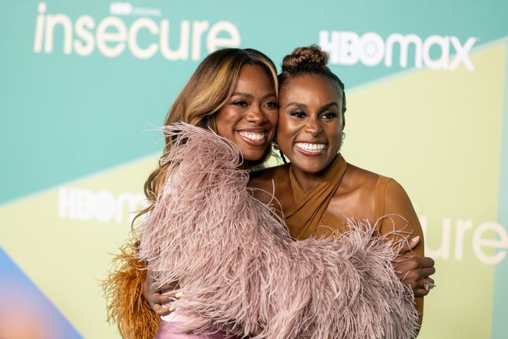 Issa Rae (right), creator and star of HBO's "Insecure," and co-star Yvonne Orji (left) arrive at the final season premiere of the show on Oct. 21 in Los Angeles.