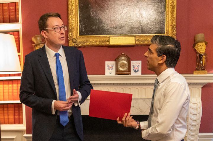 The Chancellor Rishi Sunak and the Chief Secretary to the Treasury Simon Clarke talk through the Budget in the offices of 11 Downing Street last night 