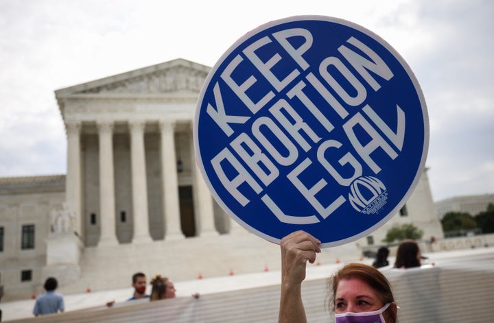 Pro-choice activists demonstrate outside the Supreme Court in early October. 