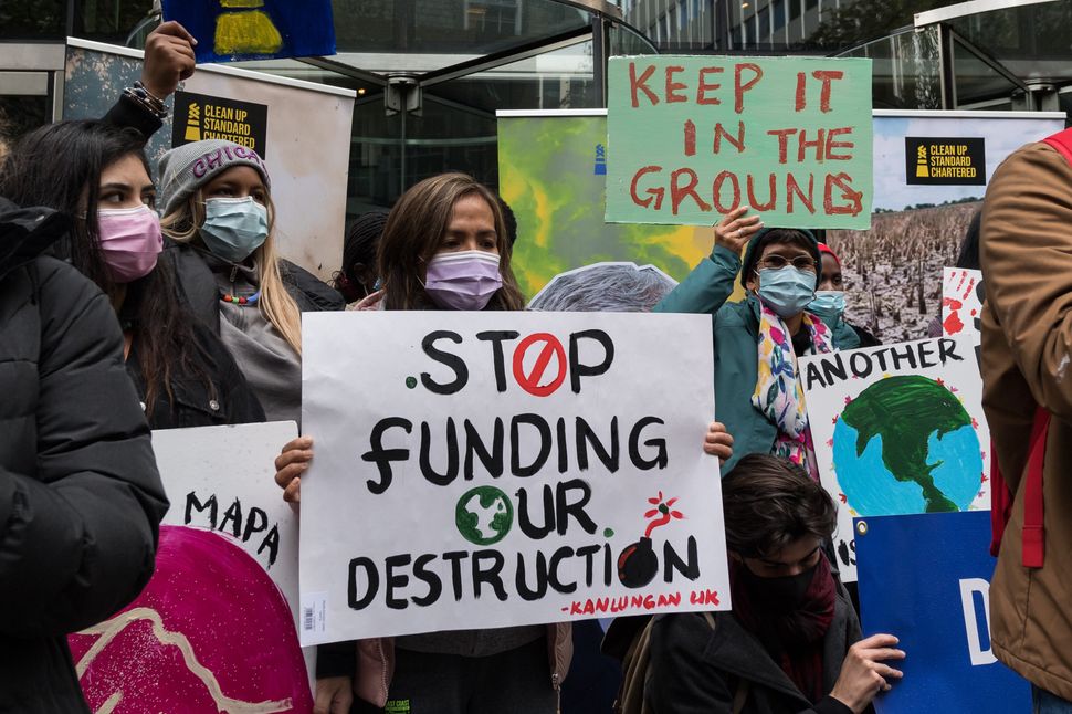 Youth climate activists protest financing fossil fuel projects outside Standard Chartered headquarters in London last week