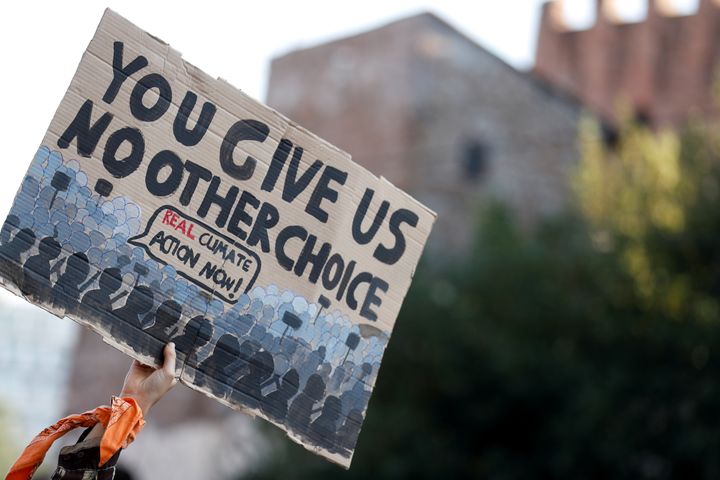 A demonstrator protests during the G20 summit in Rome, Italy, October 30, 2021. REUTERS/Yara Nardi