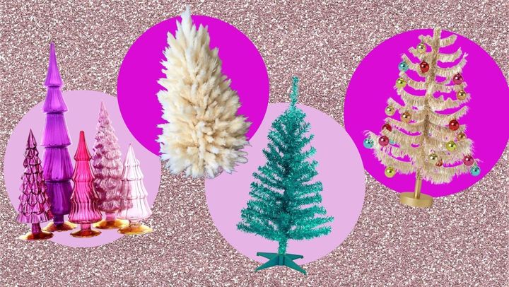 In order from left to right: Cody Foster hue violet glass trees, dried fluffy pampas grass tree, iridescent turquoise tinsel tree, medium gold tinsel tree with ornaments.