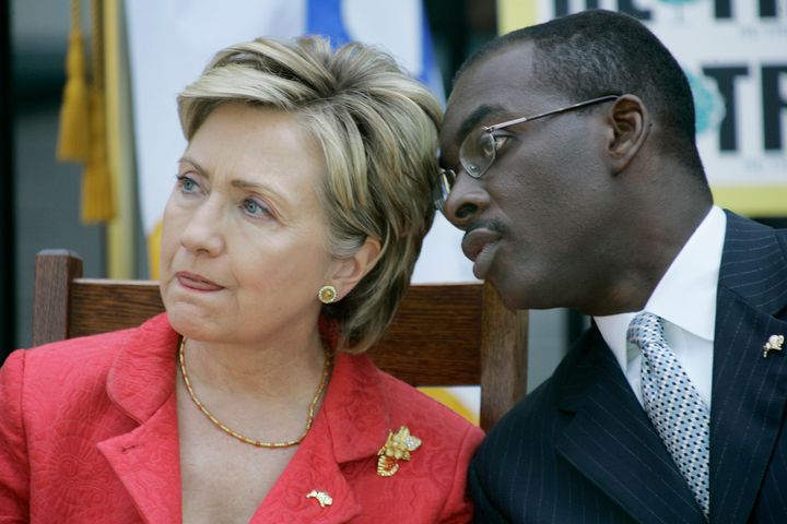Buffalo Mayor Byron Brown consults with then-Sen. Hillary Clinton (D-N.Y.) in 2007. His long tenure as mayor has inspired both deep loyalty and dissatisfaction from voters.
