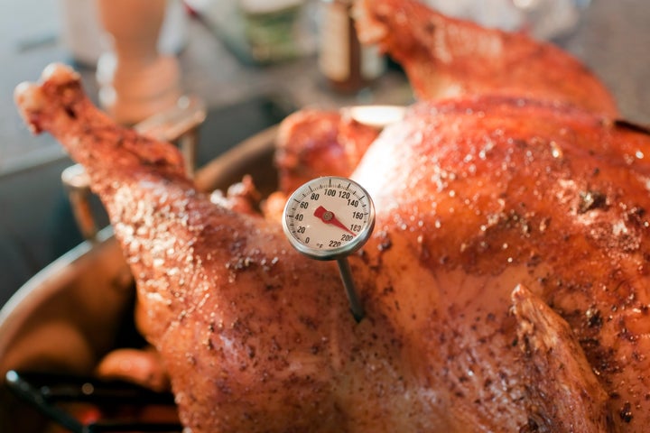 The best way to know when your turkey is done is by sticking a meat thermometer into the space between the thigh and the breast.