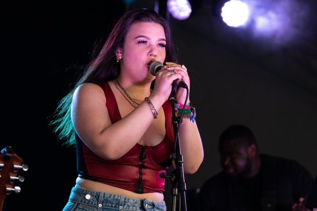 Lola performing live over the