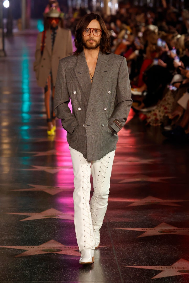 Jared Leto walks the runway between the Gucci Love Parade.