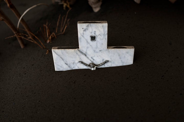 Ash covers the graves at the La Palma cemetery.