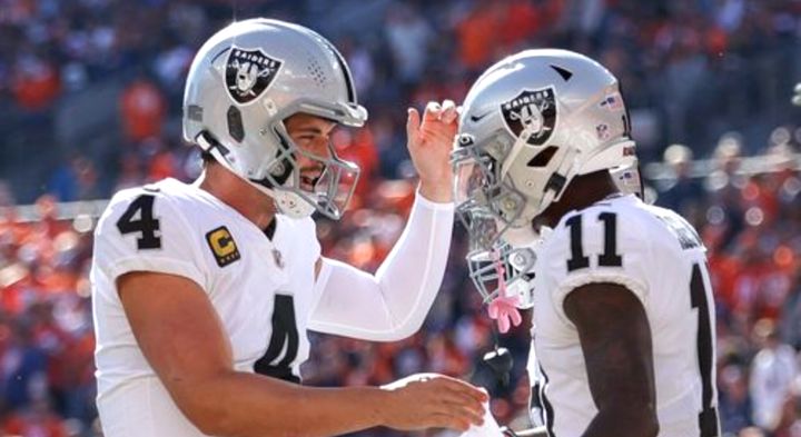 Derek Carr congratulated Henry Ruggs III during a game in October.
