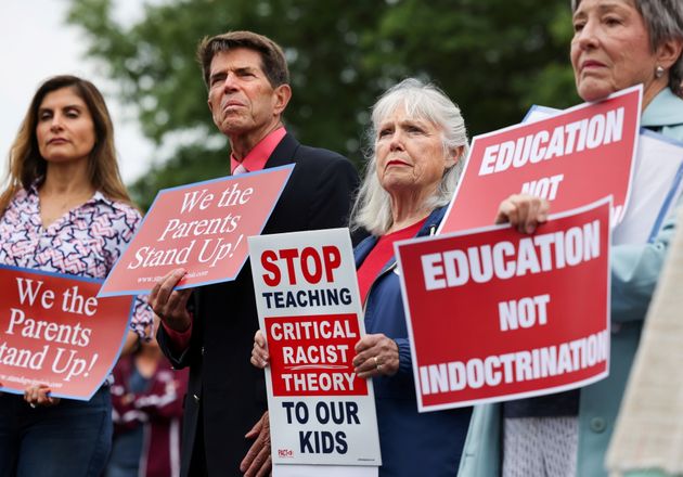 Opponents of the academic doctrine known as critical race theory protest outside Loudoun County...