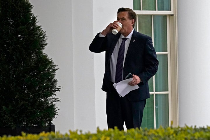 Michael Lindell, CEO of My Pillow Inc., waits to go into the West Wing of the White House on Jan. 15. Papers he brought for Donald Trump that day appeared to raise the prospect of declaring "martial law."