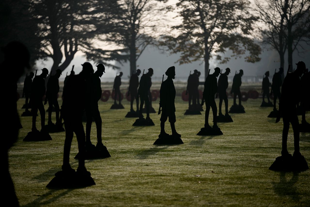 A new outdoor remembrance display, including 25 newly commissioned near-life-sized silhouettes of Indian soldiers from World War I, alongside 100 British "Tommy" soldiers, at Hampton Court Palace, in southwest London, on Nov. 3. The display represents almost 1,800 Indian soldiers who sailed to Britain in 1919 to take part in the World War I peace parade in London.