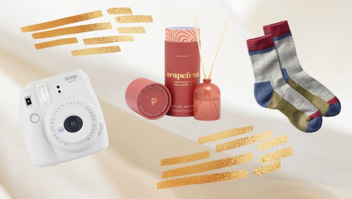 From left to right: Fujifilm Instax camera, a reed diffuser from Paddywax, and PrimaLoft socks.