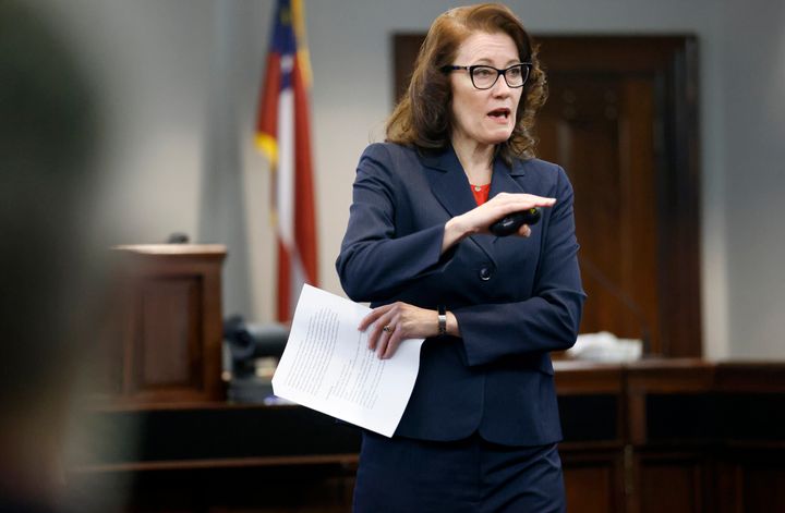 Prosecutor Linda Dunikoski speaks during opening statements in the trial of Greg McMichael, his son, Travis McMichael, and a neighbor, William "Roddie" Bryan at the Glynn County Courthouse on Nov. 5, 2021.