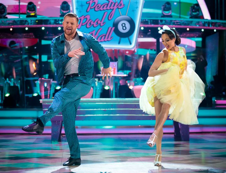 Adam Peaty and Katya Jones dancing their Jive