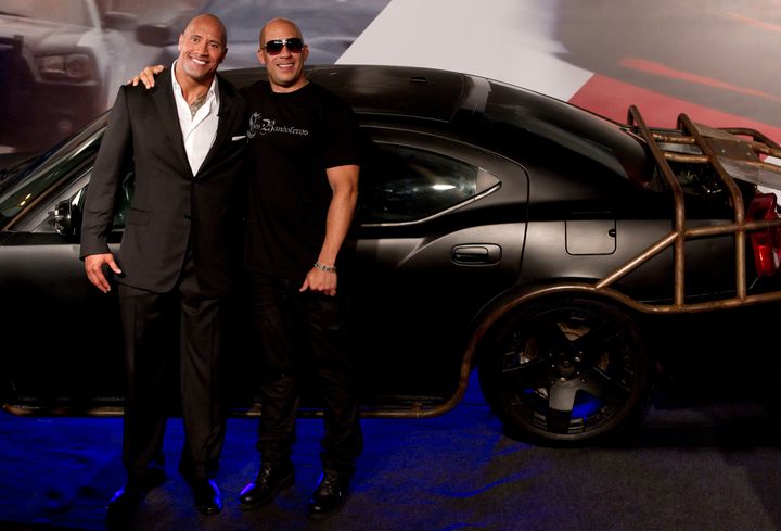 Vin Diesel and Dwayne "The Rock" Johnson posing together at a premiere