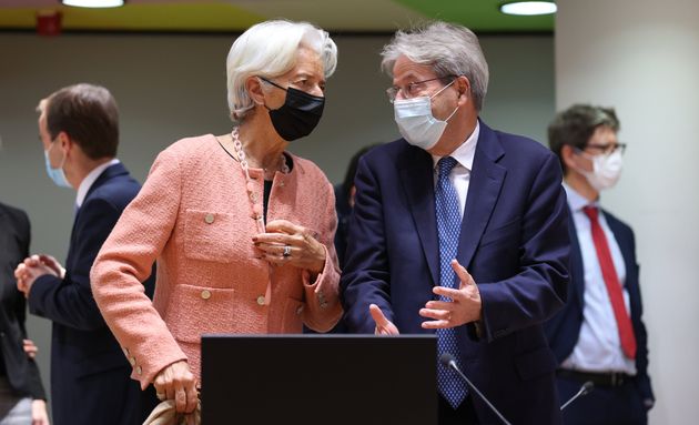 BRUSSELS, BELGIUM - NOVEMBER 8: President of the European Central Bank (ECB) Christine Lagarde (L) talks...