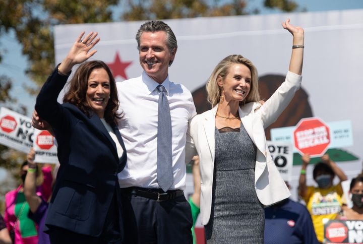 Gov. Gavin Newsom, pictured with Vice President Kamala Harris and his wife Jennifer in September, has remained out of the eye for nearly two weeks -- which is unusual for the highly visible state leader.