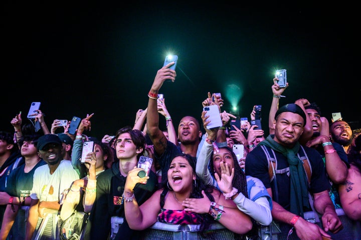 The crowd watches as Travis Scott performs at the Astroworld Festival at NRG Park in Houston on Friday. Eight people died and hundreds of others were injured in a crowd surge while Scott was performing.