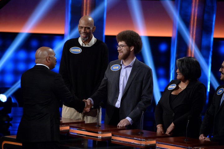 Adam Abdul-Jabbar, pictured with his father on "Celebrity Family Feud," received a sentence of 6 months in jail for stabbing his neighbor in a fight over trash cans.