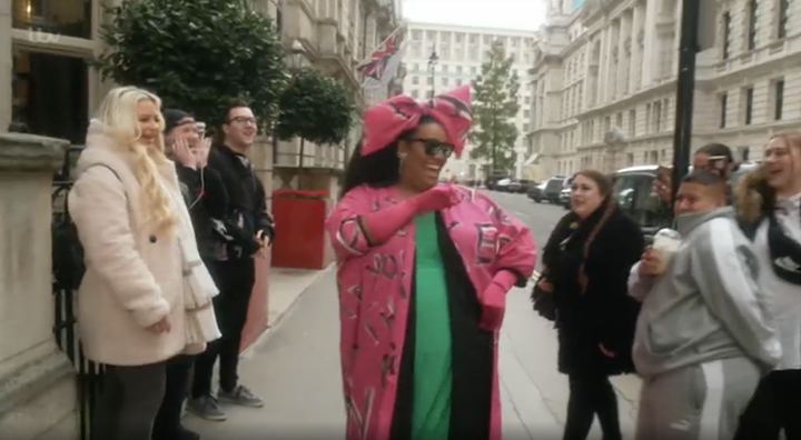 Alison greeting fans on the streets of London