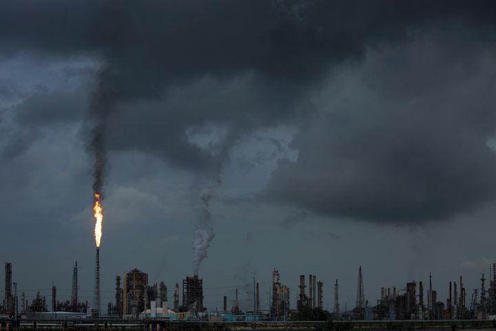 A gas flare from the Shell Chemical LP petroleum refinery illuminates the sky in Norco, Louisiana.