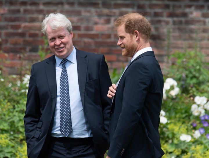Earl Spencer pictured with Prince Harry over the summer