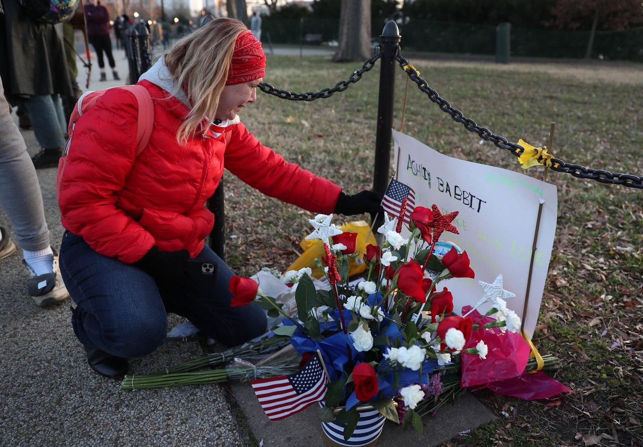 Melody Black visits a memorial near the U.S. Capitol Building for Ashli Babbitt, who was shot and killed by a police officer after breaking into the Capitol on Jan. 6, 2021.