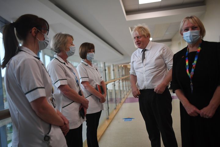 Prime Minister Boris Johnson meets with medical staff during a visit to Hexham General Hospital in Northumberland. Picture date: Monday November 8, 2021.