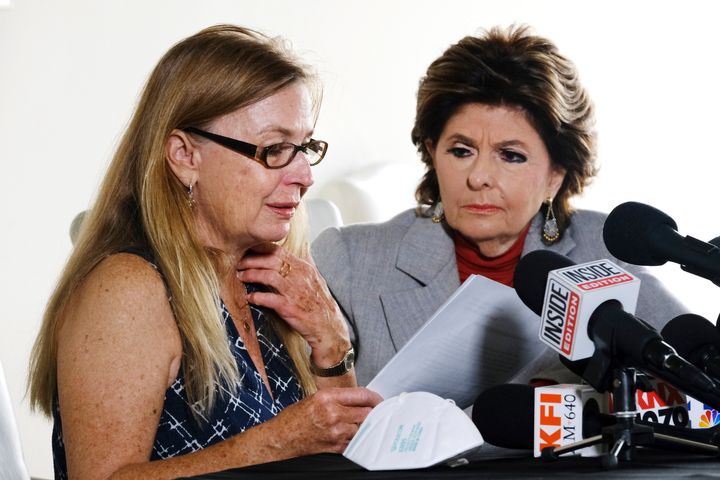 Mamie Mitchell reads a statement at a press conference alongside her attorney Gloria Allred