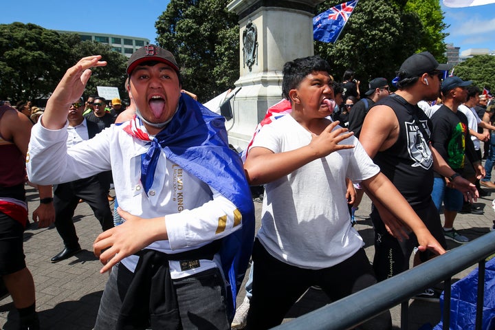 Protestors perform a haka during an anti-vaccine protest outside Parliament in Wellington, New Zealand.