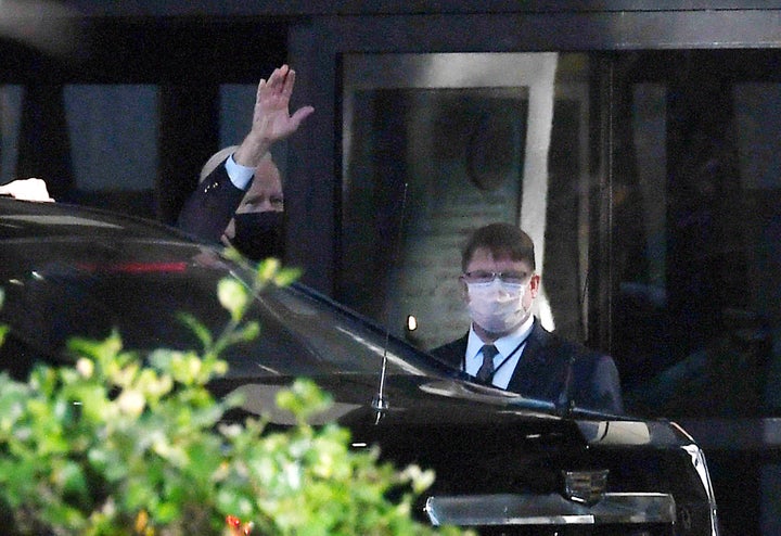 Biden waves as he arrives at Walter Reed Medical Center on Nov. 19.