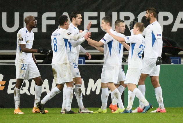 Soccer Football - Europa League - Group L - Gent v Slovan Liberec - Ghelamco Arena, Ghent, Belgium - December 3, 2020 Slovan Liberec's Kamso Mara celebrates scoring their first goal with teammates REUTERS/Johanna Geron