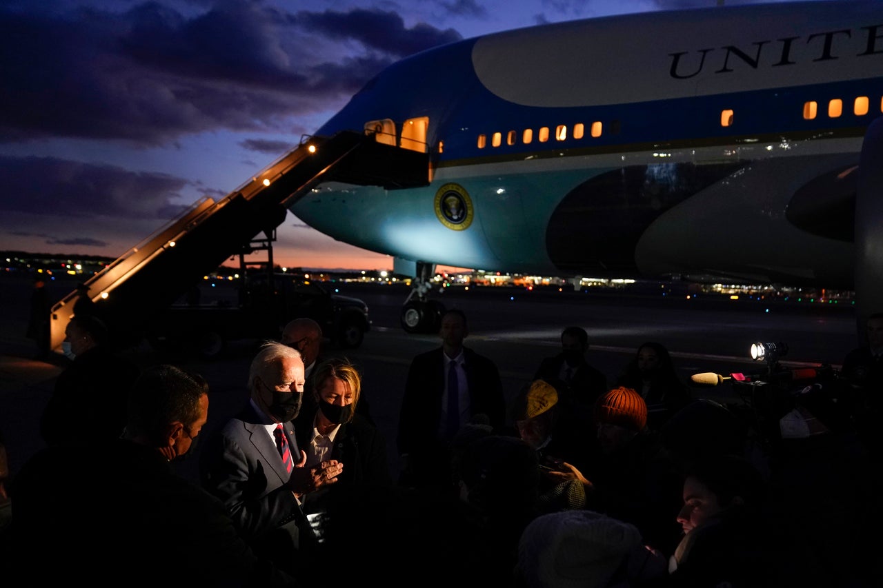U.S. President Joe Biden speaks to reporters as he prepares to depart Manchester-Boston Regional Airport, in Manchester, New Hampshire, on Nov. 16.