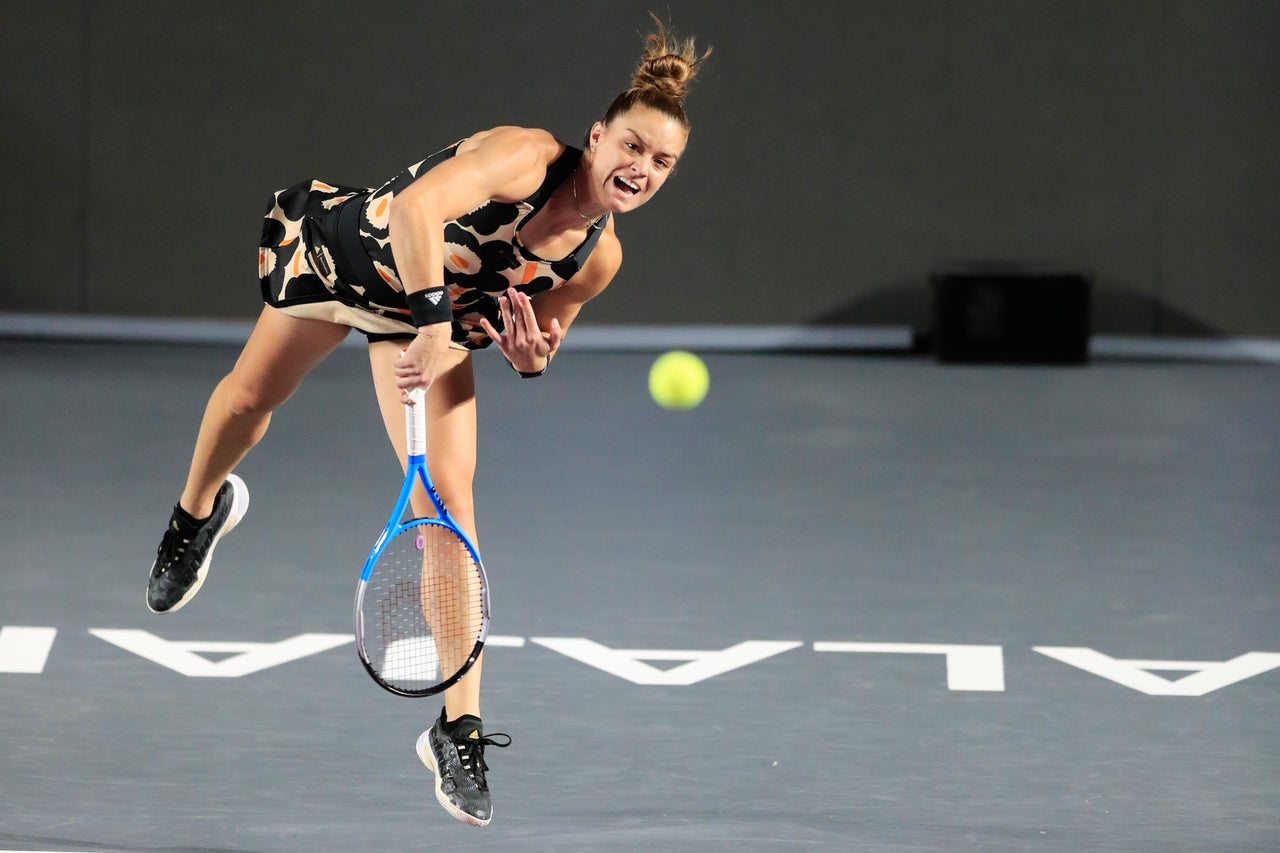 Maria Sakkari, of Greece, serves to Anett Kontaveit, of Estonia, during a semifinal match at the WTA Finals tennis tournament in Guadalajara, Mexico, on Nov. 16.