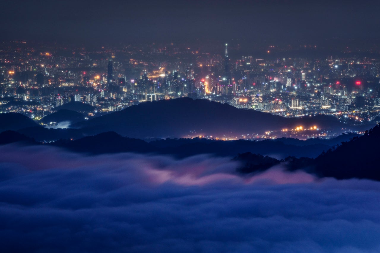 Clouds roll in over the hills above Kuala Lumpur in the Genting Highlands area in Malaysia, on Nov. 17.