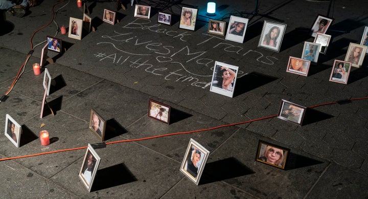 Portraits and candles at a vigil for Trans Day of Remembrance in New York City in 2020.