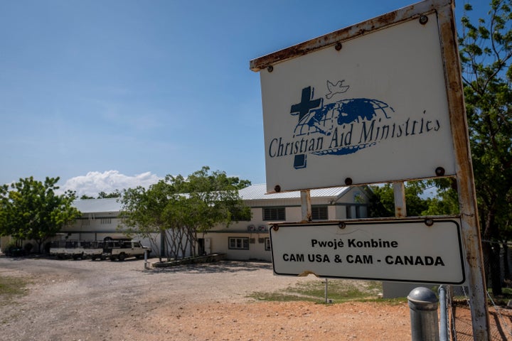 A sign is seen outside the Christian Aid Ministries in Titanyen, Haiti, on October 22, after 17 members of the missionary group were taken hostage by a Haitian gang.