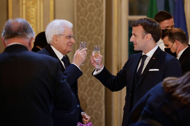 French President Emmanuel Macron (R) and Italian President Sergio Mattarella (L) toast before a state...