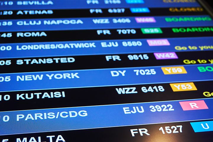 Departure board at an airport in Europe