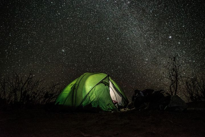 This glistening starry night is captured by a camper on their outdoor adventure by Stephane Kleeb in southern Morocco.
