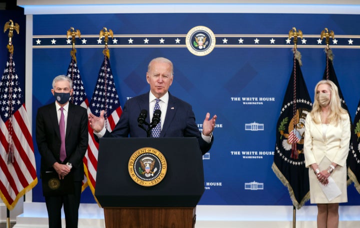 President Joe Biden speaks as Federal Reserve Board Chair Jerome Powell (left) listens during an announcement that Biden is nominating Powell to a second term.
