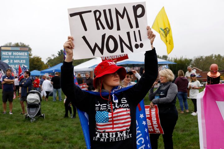 Nancy Galloway, a supporter of former President Donald Trump, protests the visit of President Joe Biden in Howell, Michigan, on Oct. 5.