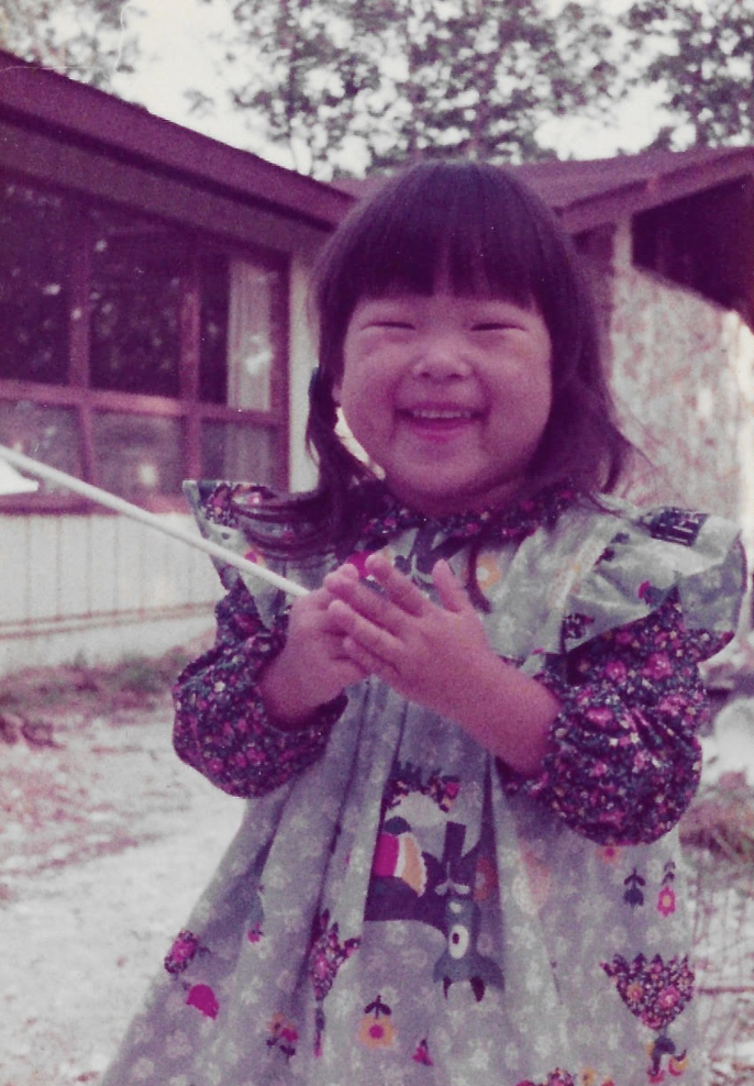 The author at age 3 in front of her house in Stony Brook, New York (1976).