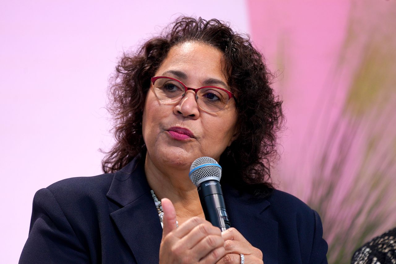 Dr. Cassandra Newby-Alexander, history professor and dean of the College of Liberal Arts at Norfolk State University, speaks on stage during a panel at NSU on Oct. 28 in Norfolk, Virginia.