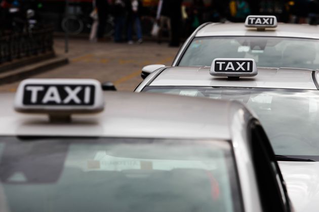 Taxi signs are seen on cars at the taxi rank in Milan, Italy on October 6, 2021. (Photo by Jakub Porzycki/NurPhoto...